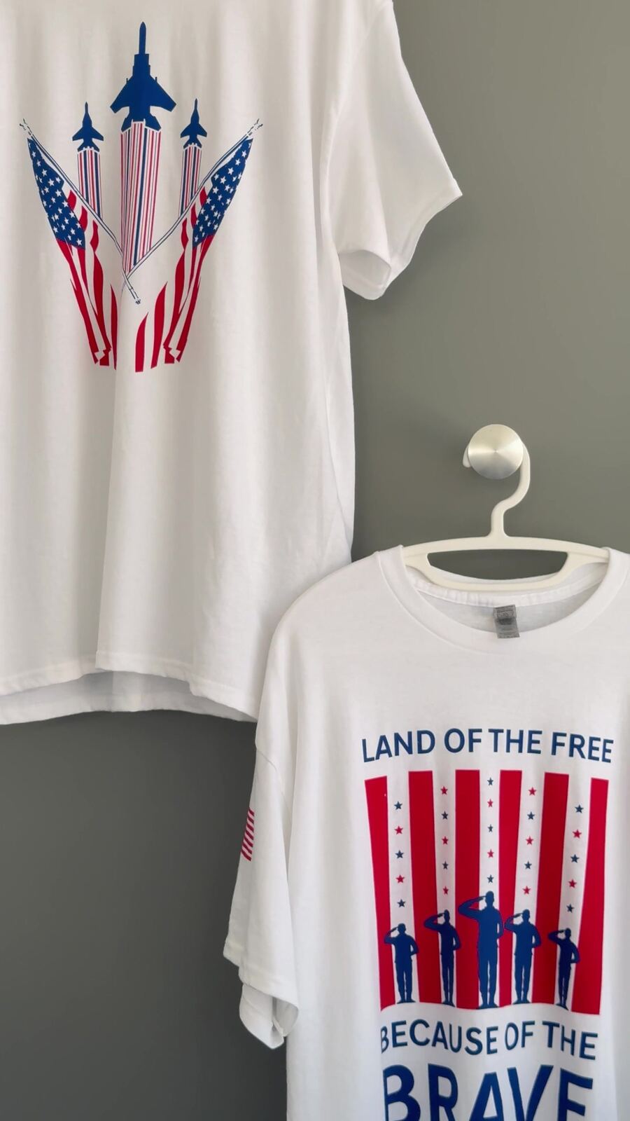 Two finished custom-printed shirts on hangers showing full-color patriotic artwork